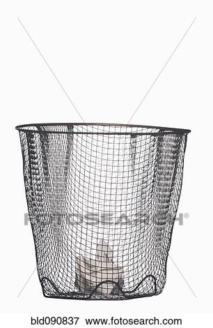 Crumpled paper in wastepaper basket View Large Photo Image Stock Photo - Crumpled paper in wastepaper basket. Fotosearch
