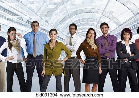 Picture - Diverse business people standing in airport. Fotosearch