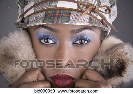 Stock Image - Fashionable mixed race woman. Fotosearch