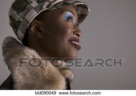 Stock Photo - Fashionable mixed race woman. Fotosearch