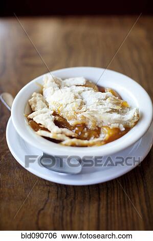 Stock Photograph - Fruit cobbler in bowl. Fotosearch