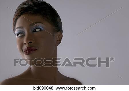 Stock Photo - Glamorous mixed race woman. Fotosearch