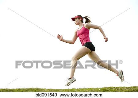 Stock Photo - Mixed race teenager running outdoors. Fotosearch
