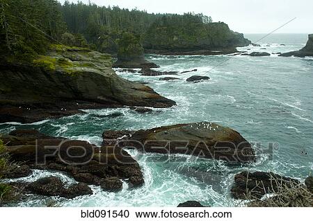 Ocean and rocky shore of remote area View Large Photo Image Stock Image - Ocean and rocky shore of remote area. Fotosearch