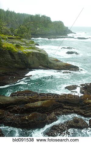 Ocean and rocky shore of remote area View Large Photo Image Stock Photo - Ocean and rocky shore of remote area. Fotosearch
