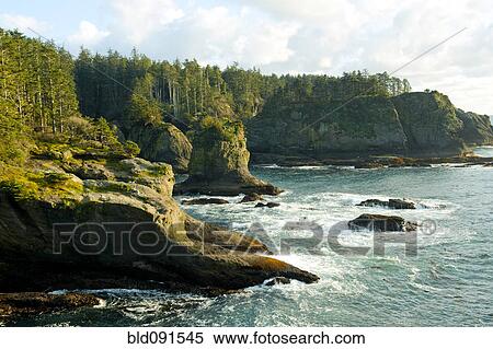 Stock Photography - Ocean and rocky shore of remote area. Fotosearch