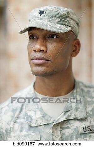 Serious Black soldier in uniform View Large Photo Image Stock Photo - Serious Black soldier in uniform. Fotosearch