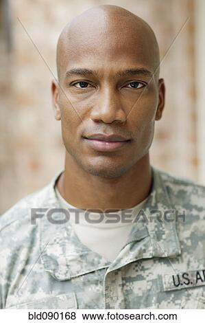 Serious Black soldier in uniform View Large Photo Image Stock Photo - Serious Black soldier in uniform. Fotosearch