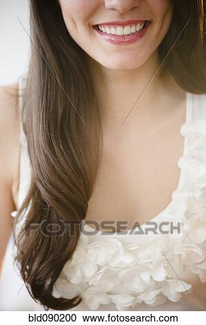 Stock Image - Smiling Brazilian woman. Fotosearch