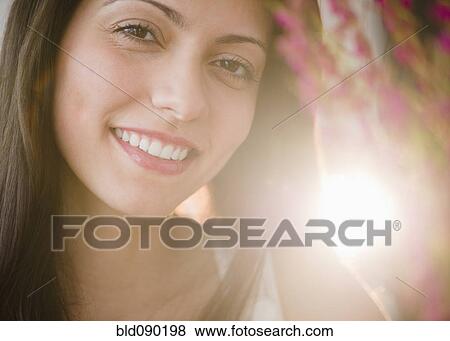 Stock Photo - Smiling Brazilian woman. Fotosearch
