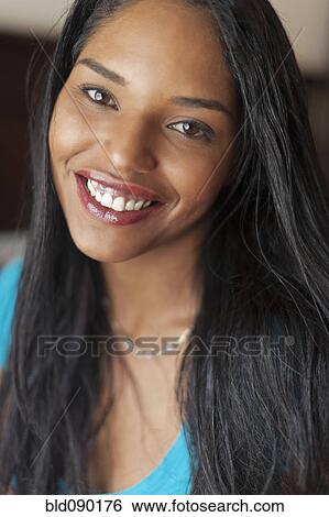 Smiling mixed race woman View Large Photo Image Stock Photograph - Smiling mixed race woman. Fotosearch