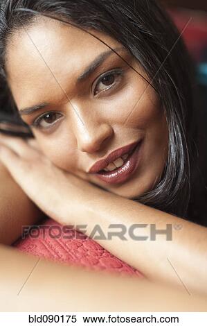 Stock Photography - Smiling mixed race woman. Fotosearch