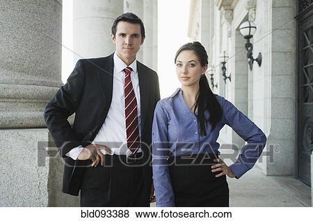 Caucasian business people standing outdoors View Large Photo Image Stock Photo - Caucasian business people standing outdoors. Fotosearch