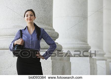 Caucasian businesswoman standing outdoors View Large Photo Image Picture - Caucasian businesswoman standing outdoors. Fotosearch