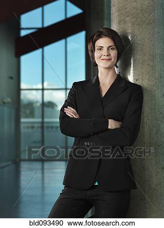 Caucasian businesswoman with arms crossed View Large Photo Image Stock Image - Caucasian businesswoman with arms crossed. Fotosearch