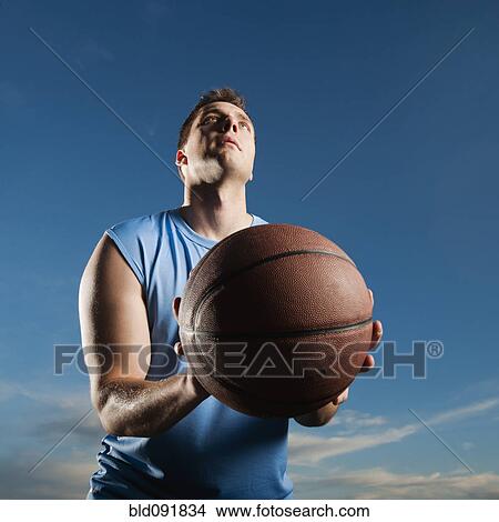 Caucasian man playing basketball View Large Photo Image Picture - Caucasian man playing basketball. Fotosearch