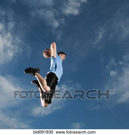 Caucasian man playing basketball View Large Photo Image Stock Image - Caucasian man playing basketball. Fotosearch