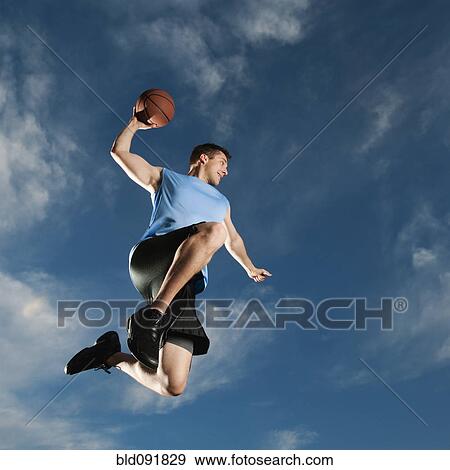 Caucasian man playing basketball View Large Photo Image Stock Photo - Caucasian man playing basketball. Fotosearch