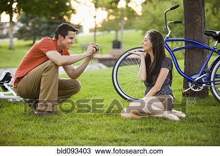 Caucasian man taking picture of wife View Large Photo Image Stock Image - Caucasian man taking picture of wife. Fotosearch