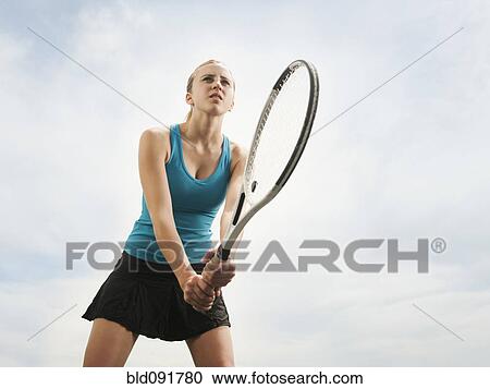 Caucasian woman playing tennis View Large Photo Image Stock Image - Caucasian woman playing tennis. Fotosearch