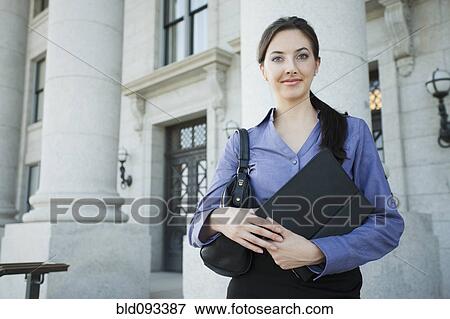 Stock Photo - Caucasian woman standing outdoors. Fotosearch
