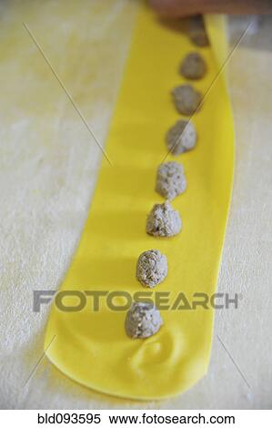 Stock Photography - Chef making homemade agnolotti. Fotosearch