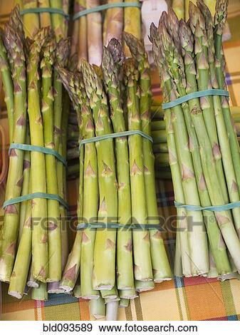 Stock Photo - Close up of asparagus bunches. Fotosearch