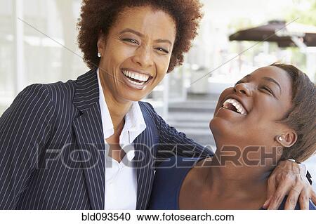 Laughing African American mother and daughter View Large Photo Image Stock Image - Laughing African American mother and daughter. Fotosearch