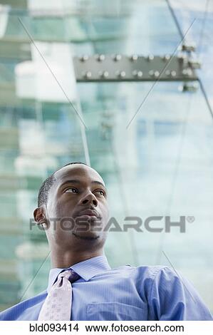 Picture - Serious Black businessman. Fotosearch