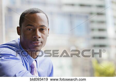 Stock Photo - Serious Black businessman. Fotosearch