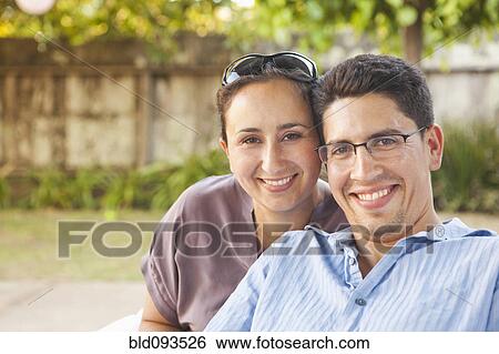 Stock Photograph - Smiling Hispanic couple. Fotosearch