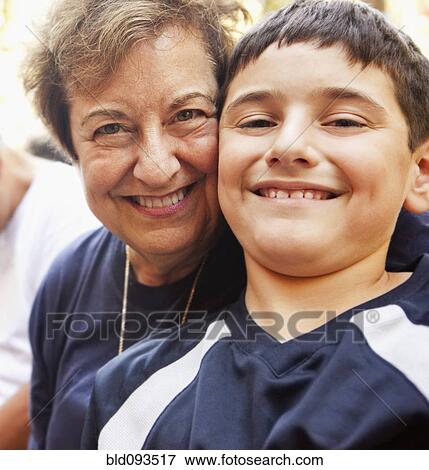 Stock Photo - Smiling Hispanic grandmother and grandson. Fotosearch