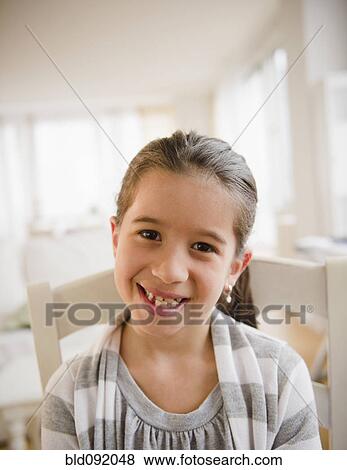 Stock Photo - Smiling mixed race girl. Fotosearch