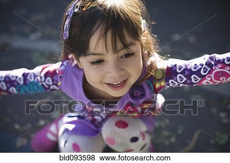 Stock Photo - Smiling mixed race girl. Fotosearch