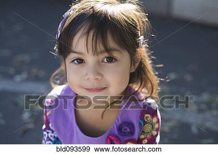 Smiling mixed race girl View Large Photo Image Stock Photo - Smiling mixed race girl. Fotosearch