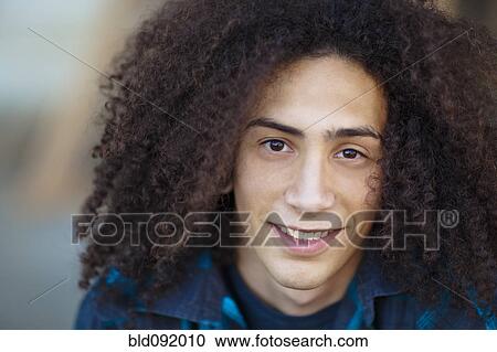 Smiling mixed race teenager View Large Photo Image Stock Image - Smiling mixed race teenager. Fotosearch