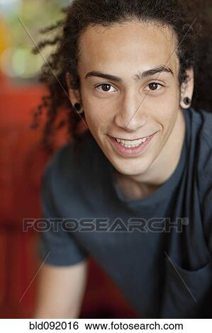 Smiling mixed race teenager View Large Photo Image Stock Photograph - Smiling mixed race teenager. Fotosearch
