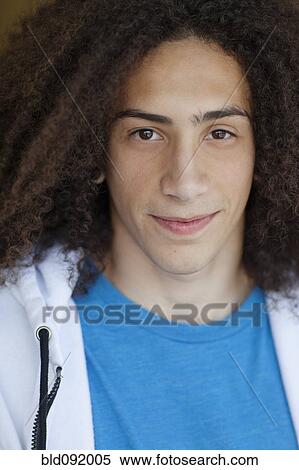 Stock Photography - Smiling mixed race teenager. Fotosearch