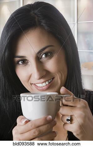 Turkish woman drinking coffee View Large Photo Image Stock Photo - Turkish woman drinking coffee. Fotosearch