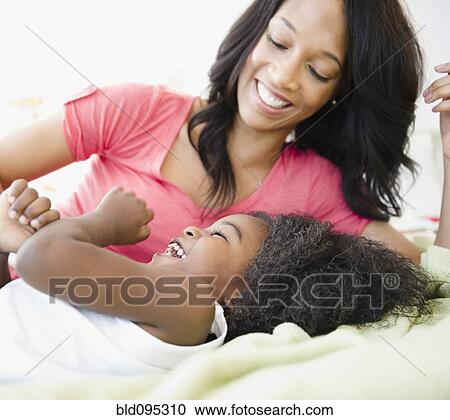 African American mother playing with son View Large Photo Image Stock Image - African American mother playing with son. Fotosearch