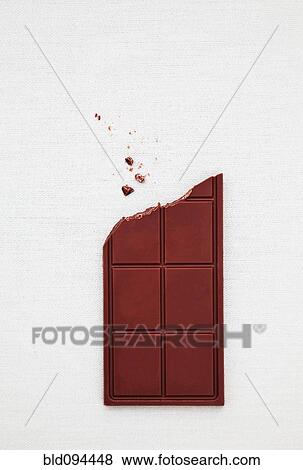 Stock Photo - Bite missing from chocolate bar. Fotosearch