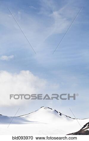 Stock Image - Blue Sky over Castleguard Mountain. Fotosearch