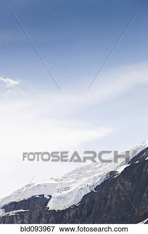 Stock Photo - Blue sky over Snow Dome. Fotosearch