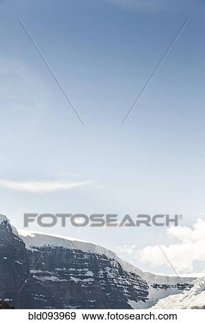 Stock Photo - Blue sky over Snow Dome. Fotosearch