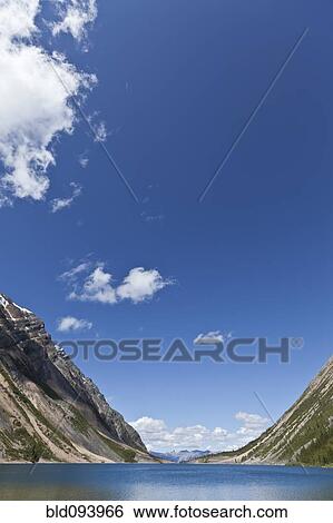 Stock Photograph - Blue sky over Upper Geraldine Lake. Fotosearch
