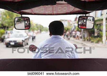 Cambodian rickshaw driver on street View Large Photo Image Stock Image - Cambodian rickshaw driver on street. Fotosearch