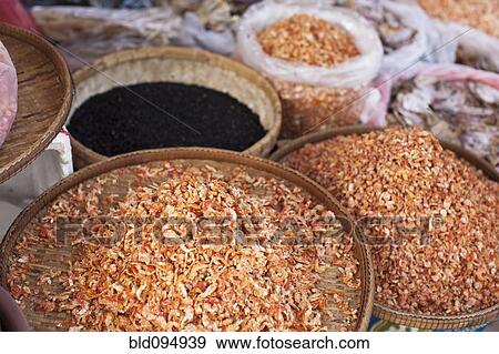 Stock Photo - Dried shrimp in trays. Fotosearch