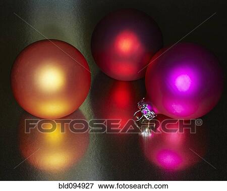 Stock Photo - Festive colored Christmas ornaments. Fotosearch