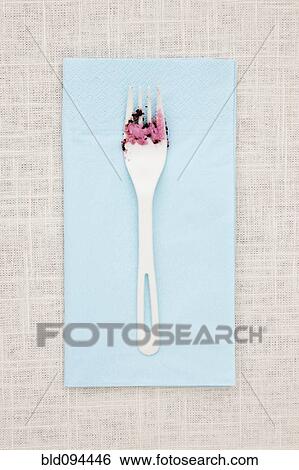 Fork on napkin with icing View Large Photo Image Stock Photograph - Fork on napkin with icing. Fotosearch