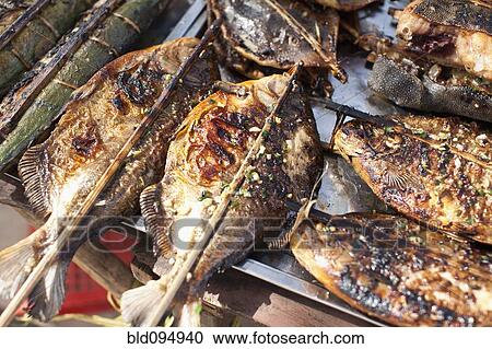 Grilled fish in market View Large Photo Image Stock Image - Grilled fish in market. Fotosearch